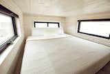 The master loft fits a king bed, and features an egress window and two awnings.

