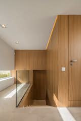 Hallway and Limestone Floor  Photo 12 of 16 in M3 House by OLARQ Osvaldo Luppi Architects