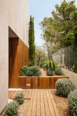 Outdoor, Stone, Walkways, Decking, Side Yard, Trees, Landscape, Wood, and Shrubs  Outdoor Trees Landscape Photos from M3 House