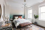 The master bedroom where the couple put efforts to express their taste has the most vibrant color palette through the marriage of industrial and bohemian styles.