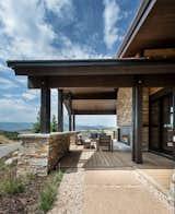 Extending the living area into the outside including an outdoor fireplace makes this home well equipped to host a crowd.