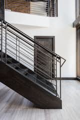 Keeping the lines clean, these modern stairs embrace the contemporary feel throughout this home.