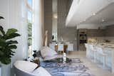 Living Room, Chair, Recessed Lighting, and Coffee Tables Chef-inspired kitchen, formal dining and seating area  Photo 2 of 9 in Luxe Townhome in Miami's Design District by Ivanna Agudo