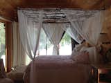 Very romantic master suite w bath soaking tub porch yoga area and view to water 