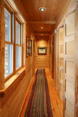 Beautiful pine hallway with Washer Dryer and photos by Neil Parent 