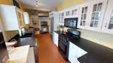 Kitchen  Photo 15 of 21 in The Sumner Mansion by Brick & Barn Real Estate Group 