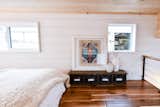 Bedroom, Bed, Wall Lighting, and Dark Hardwood Floor Main Loft  Photo 4 of 24 in Solar Tiny for Family of 5. by Tru Form Tiny