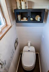 Composting, urine diverting toilet.