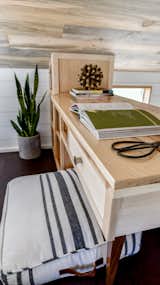 Bedroom, Bookcase, Dark Hardwood Floor, Dresser, and Storage Loft Desk.  Tru Form Tiny  Photo 12 of 28 in Full Solar Tiny Home & Open Layout by Tru Form Tiny