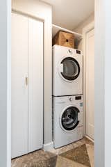 Laundry and storage into bathroom 