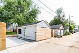 Exterior, ADU Building Type, Shed RoofLine, and Shingles Roof Material After - Alley with garages  Photo 8 of 19 in ADU @ Tiny Garage by ileana schinder