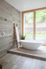 Bath Room, Freestanding Tub, Open Shower, Porcelain Tile Wall, and Porcelain Tile Floor  Photos from Idea House