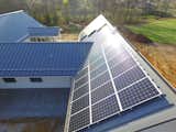 During the warmest May on record, Peckham Architecture's LEED Platinum home headquarters produced so much electricity that it earned a utility bill credit of $179.  Photo 5 of 8 in Mid-Missouri Passive House by Peckham Architecture