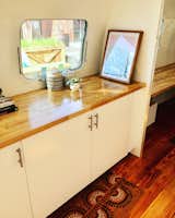 Office, Dark Hardwood Floor, and Storage  Photo 3 of 13 in Modern Airstream Office by Andy Schnack
