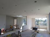 Sheetrock  -and the finishes begin! A light filled modern space