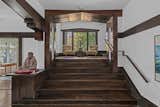 Staircase, Wood Tread, and Wood Railing Lovely mezzanine-level sitting area, perfect for reading, waiting and/or chatting.  Photo 8 of 17 in Grand Architectural Masterpiece offered for $3.85M in Oakland, California by Red Oak Realty