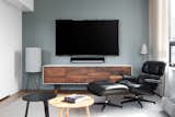 All-Black Eames Lounger balancing the TV