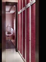 Bedroom 2 -  For the height of visual impact, the second bedroom features an expanse of Magenta fitted wardrobes.The door fronts embrace  the art of East Asian soft furnishings with Japanese fabric wrapped doors and painted frames. 
