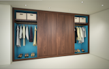 Sliding Doors
Sample 3 of a selection of Triple Wardrobes with Arcadia-style Sliding Doors and a host of organizational interior storage solutions: shown open and closed.  
This wardrobe conceptual design with sliding doors benefits from opening horizontally to allow the door to slide parallel to the wardrobe or a wall. There are several types of sliding door and this concept highlights the Arcadia-style doors featuring three panel sections, one fixed-stationary and two mobile that slide open: price on application.
