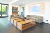 Not only does William Garvey’s Bespoke Coffee Table with Isolation design feature cut a striking figure, but both its look and function can be altered to suit any interior style or space. This practical, yet exceptionally stylish handcrafted design allows for three isolated tables to be either divided or come together as one. 

Guaranteed to present a unique appearance regardless of how the tables are displayed, William Garvey’s contemporary table design is manufactured from European walnut and features robust, yet hidden magnets beneath the veneer to connect the table together; ideal for everyday furniture with luxury appeal. 

Prices for William Garvey’s Bespoke Coffee Table with Isolation design feature in European Walnut starts from £3,708 +vat. The dimensions for the table in its complete state are Length 1500mm x Height 400mm x Width 500mm. 
