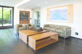 Not only does William Garvey’s Bespoke Coffee Table with Isolation design feature cut a striking figure, but both its look and function can be altered to suit any interior style or space. This practical, yet exceptionally stylish handcrafted design allows for three isolated tables to be either divided or come together as one. 

Guaranteed to present a unique appearance regardless of how the tables are displayed, William Garvey’s contemporary table design is manufactured from European walnut and features robust, yet hidden magnets beneath the veneer to connect the table together; ideal for everyday furniture with luxury appeal. 

Prices for William Garvey’s Bespoke Coffee Table with Isolation design feature in European Walnut starts from £3,708 +vat. The dimensions for the table in its complete state are Length 1500mm x Height 400mm x Width 500mm. 
