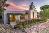 Front Patio Offers An Additional Space For Entertaining Surrounded By Lush Desert Landscaping