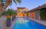 Lap Pool With Water Feature At Dusk