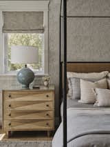 iron bed and wood nightstand