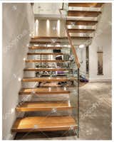 glass floating staircase www.gdstair.com