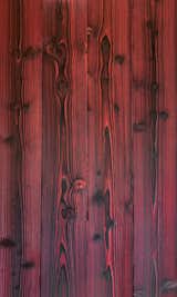 LARCH EMBER

Traditionally Inspired American Made™. This 18th century technique of preserving wood with fire is refreshed for today’s design. Aggressively burning the surface layer of our sustainably harvested Larch, we then wire-brush each plank multiple times to remove the soft char and expose the contrasting grain below. This heavily textured and visually dynamic surface can be left unfinished or can be coated with an exterior grade finish in a selection of cool greys, warm browns, or a pop of color.

Larch is a durable wood exterior option with attractive tones, interesting grain patterns, rot, insect and fire-resistant. Our Shou Sugi Ban Larch Twice-Brushed can just as comfortably clad an interior wall providing a bold statement to any indoor design.