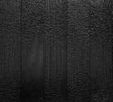 ACCOYA DEEP CHAR

Traditionally Inspired, American Made™—an 18th century technique for preserving wood with fire is updated to meet 21st century design and performance standards. With our Forest Stewardship Council® Certified and Cradle-to-Cradle Certified™ Accoya Deep Char we aggressively burn each board until the signature “alligator skin” texture is achieved, then apply an unobtrusive finish to enhance and protect the iridescent black surface.

Accoya Deep Char combines durability and sustainability. This modern, modified-wood option provides stability in nearly any environment. Traditionally maintenance-free, the charred layer is expected to change over time when exposed to the elements. We finish our Deep Char with an ebony tinted poly sealer to protect and prolong its distinctive look—Accoya Deep Char provides longevity to be enjoyed for decades to come.