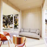 Living space with hidden Murphy bed wall. 