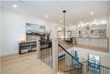 Open Upstairs Walkways Separating Bedrooms