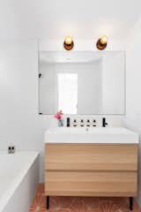 Bath Room, Freestanding Tub, Soaking Tub, Ceiling Lighting, One Piece Toilet, Concrete Floor, and Wall Lighting  Photo 12 of 13 in Mid Century Glass Box Inspired by Philip Johnson's Glass House in East Hampton Springs NY by Yorgos Tsibiridis
