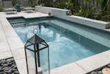 Outdoor, Concrete Pools, Tubs, Shower, Shrubs, Hardscapes, Back Yard, Small Patio, Porch, Deck, Concrete Patio, Porch, Deck, Concrete Fences, Wall, Wood Fences, Wall, Plunge Pools, Tubs, Shower, Vertical Fences, Wall, Hot Tub Pools, Tubs, Shower, Pavers Patio, Porch, Deck, Flowers, and Small Pools, Tubs, Shower  Photo 13 of 14 in Paradise Preserve | Atlantic Beach Contemporary Backyard by Cascade Outdoor Design