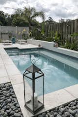 Outdoor, Concrete Pools, Tubs, Shower, Back Yard, Flowers, Plunge Pools, Tubs, Shower, Shrubs, Concrete Patio, Porch, Deck, Hardscapes, Hot Tub Pools, Tubs, Shower, Small Patio, Porch, Deck, Small Pools, Tubs, Shower, Wood Fences, Wall, Vertical Fences, Wall, Pavers Patio, Porch, Deck, and Concrete Fences, Wall  Photo 12 of 14 in Paradise Preserve | Atlantic Beach Contemporary Backyard by Cascade Outdoor Design