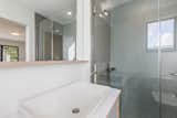 Turquoise penny tile in the upper en-suite bathroom.