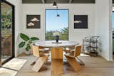 Round dining table with 8 zigzag chairs