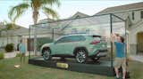 Outdoor, Back Yard, and Metal Fences, Wall Original frame and solid sheets of plexiglass in Toyota "Encased" spot.  Photo 4 of 4 in The Plexi-Hut by Jordan Brady