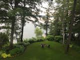 view of gardens and waterfront from upper deck