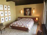 Mid-Century art and furnishings brings this second bedroom to life. Entire north wall is windows facing the water....outside balcony connects to upper deck.