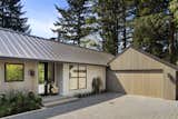 Exterior, Concrete Siding Material, Metal Roof Material, House Building Type, and Wood Siding Material  Photo 3 of 17 in Burton House by Sam Dowlatdad, Broker & Esq.