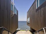 Exterior, House Building Type, and Wood Siding Material  Photo 3 of 8 in Two Hulls House by Nadia Halim