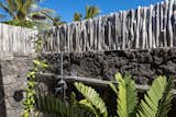 Exterior and Stone Siding Material Outdoor Shower  Photo 19 of 34 in Manini`owali Villa 5 by Sunnland Architects