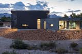 Exterior, House Building Type, Stucco Siding Material, Flat RoofLine, Metal Roof Material, and Metal Siding Material exterior twilight  Photos from The Rubber Ducky Trail House