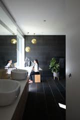 Bath Room, Vessel Sink, Ceramic Tile Wall, Pendant Lighting, and Ceramic Tile Floor  Photos from G'Day House