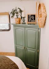 "We decided to bring the kale-green shade from the kitchen into the bedroom by painting the wardrobe green,"&nbsp; adds Lauren.