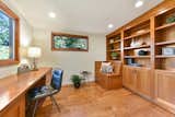 Office study with built-in cabinetry.