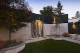 Easton Residence back garden and fountain at twilight