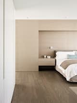 Bedroom, Bed, Night Stands, and Medium Hardwood Floor  Photos from Private Residence 4